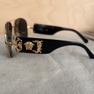 Versace Sunglasses with Black Frame and Gold Detailing